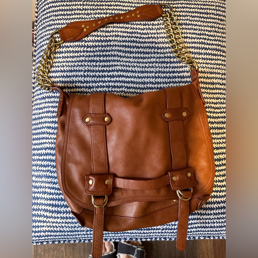 brown genuine leather purse with gold accents by Sabina